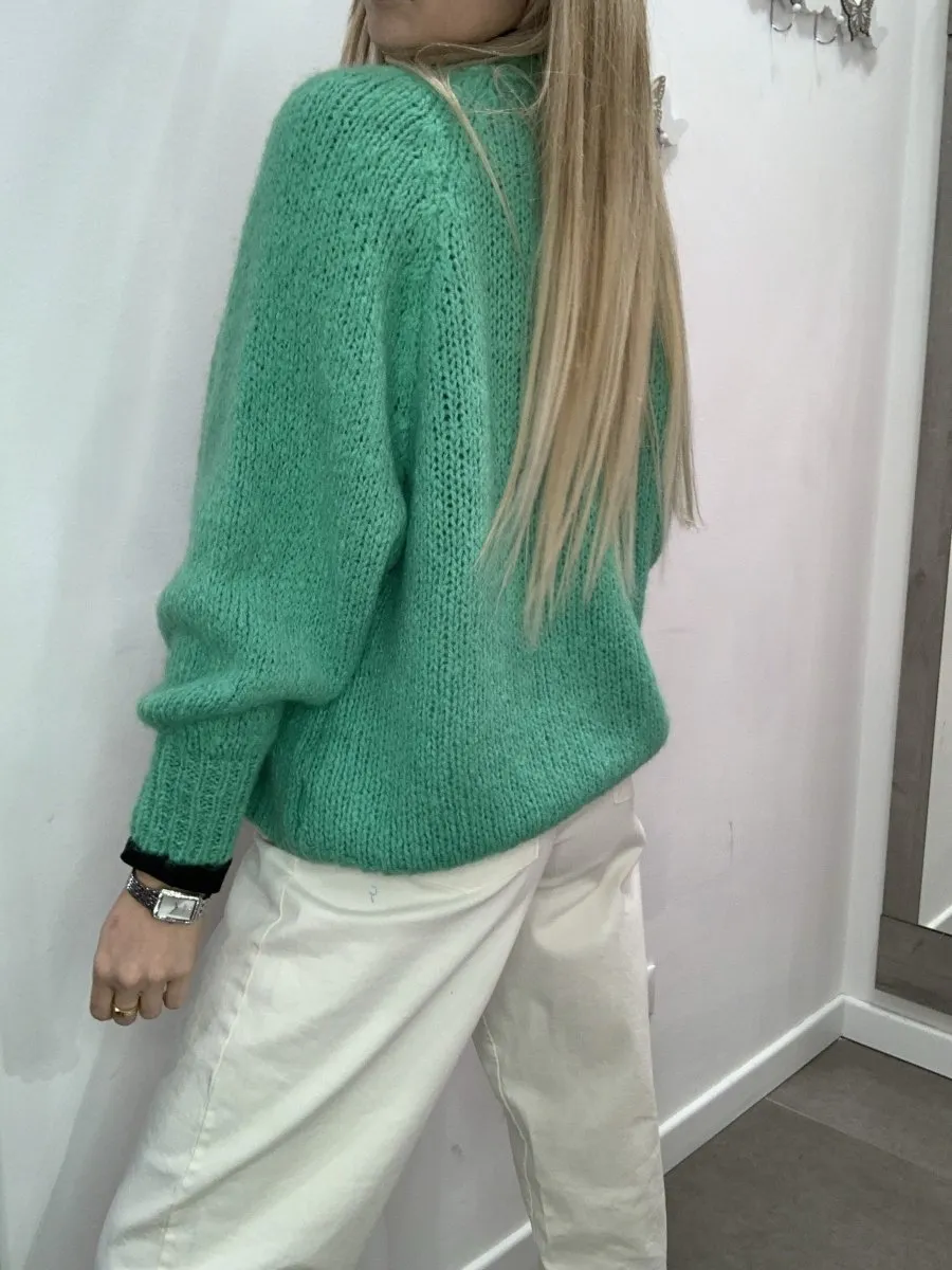 Cardigan verde di lana con manica a palloncino